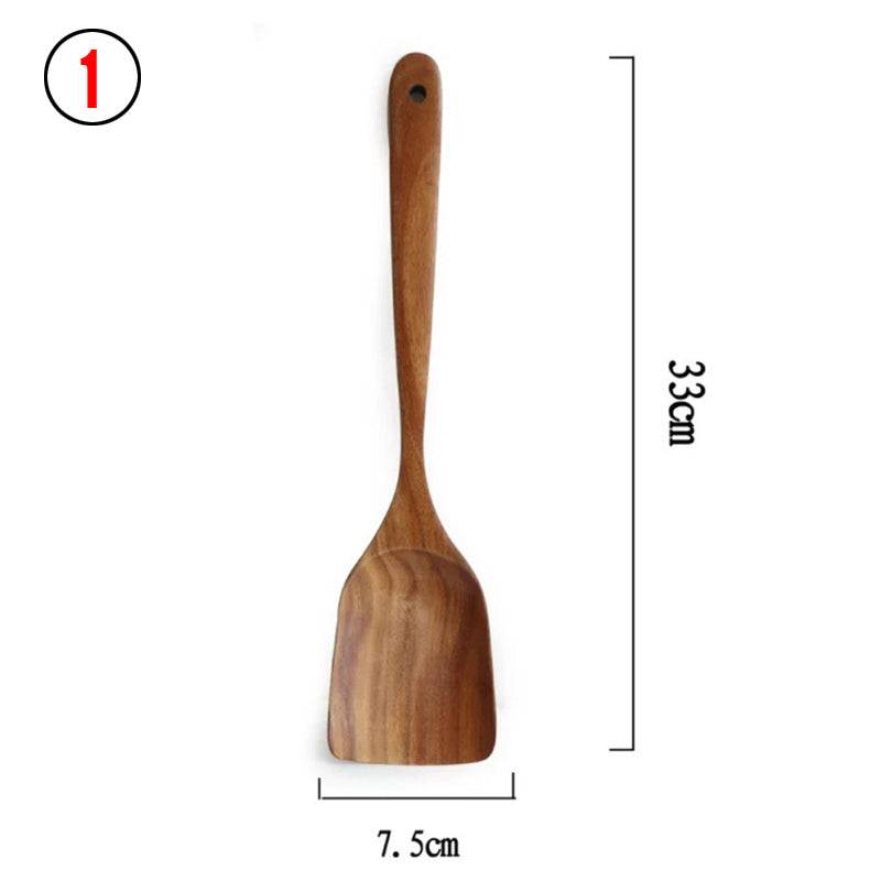 Teak wood kitchen turner from Thailand, measuring 33cm in length and 7.5cm in width. Durable and eco-friendly, perfect for cooking and serving.