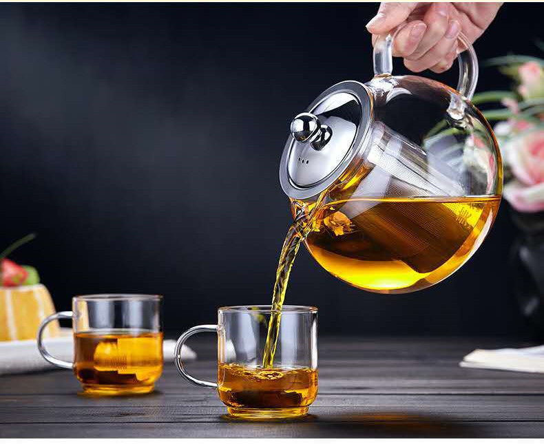 Pouring tea from Flower Glass Teapot