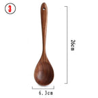 Teak wood kitchen spoon measuring 26cm in length and 6.3cm in width. Crafted from natural Thai teak, perfect for cooking and serving.