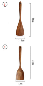 Teak wood kitchen turner with a 32cm length and 7.5cm width, crafted from natural Thai wood. Ideal for cooking and serving.