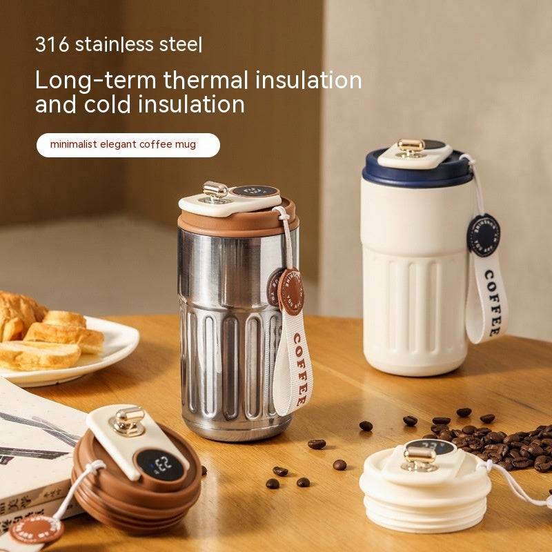 Elegant stainless steel and white smart digital thermal bottles with temperature display, 450ml. Ideal for coffee lovers seeking long-lasting insulation.