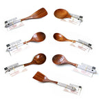 Set of 7 colorful teak kitchen utensils with lacquer finish, including Japanese-style soup spoons and vegetable shovels. Eco-friendly and non-stick safe.