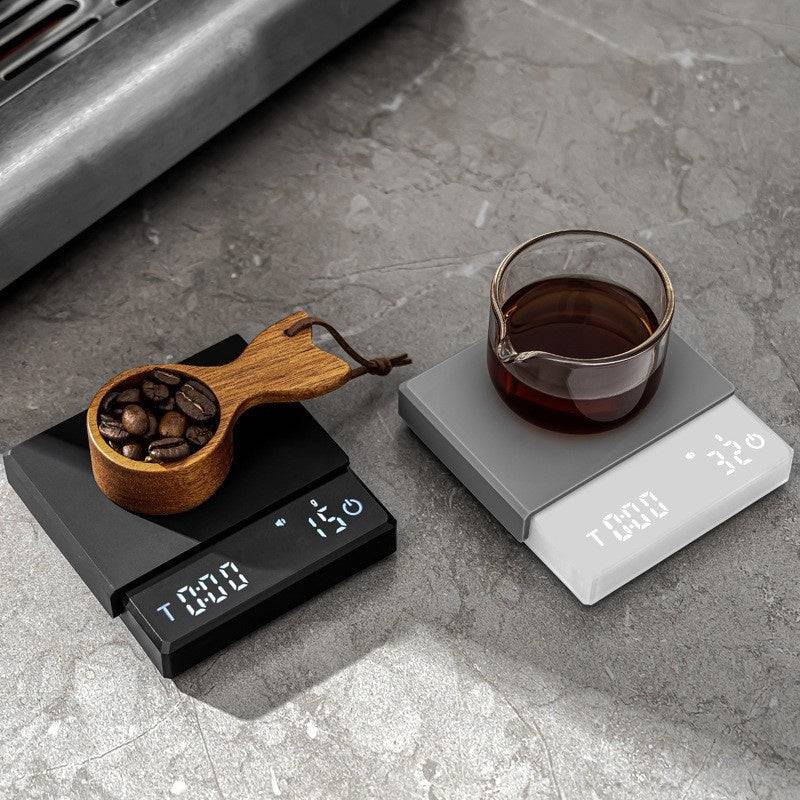 Smart coffee scale with high-precision 0.1g accuracy and built-in timer, compact and rechargeable, ideal for precise pour-over brewing at home or café.