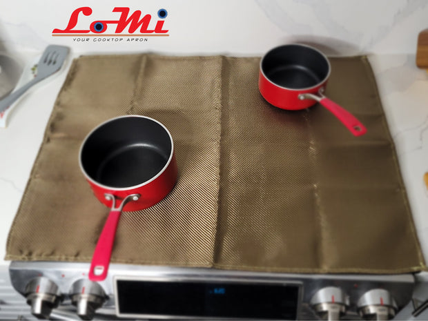 a pair of red pots sitting on top of a stove