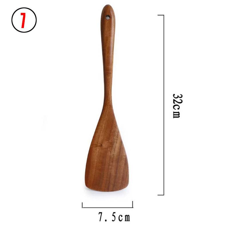 Teak wood kitchen turner from Thailand, measuring 32cm in length and 7.5cm in width. Durable and eco-friendly, perfect for cooking and serving.