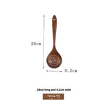 Wooden slotted spoon strainer, 28cm long and 8.2cm wide, on white background.