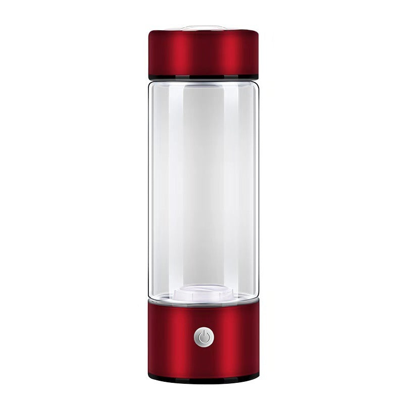 Red electric hydrogen water bottle with a transparent body. Rechargeable and portable, designed for antioxidant-rich hydration anywhere.