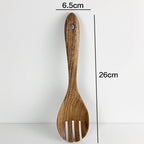 Teak wood kitchen fork spoon measuring 26cm in length and 6.5cm in width. Durable and eco-friendly Thai tableware for cooking and serving.