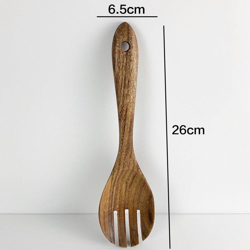Teak wood kitchen fork spoon measuring 26cm in length and 6.5cm in width. Durable and eco-friendly Thai tableware for cooking and serving.