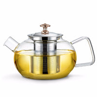 Large capacity glass teapot filled with brewed tea"