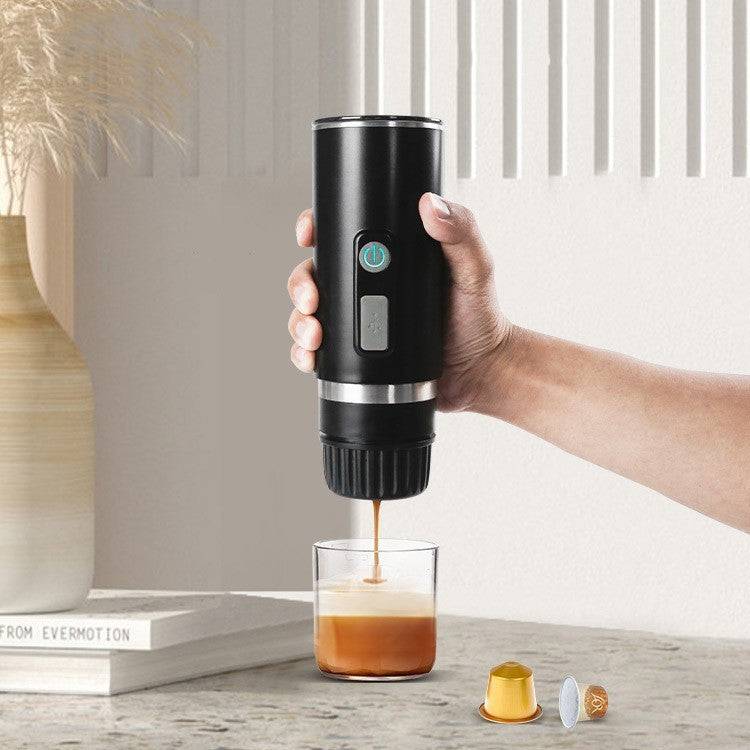 Portable espresso coffee machine with automatic capsule operation, sleek black design, and compact size. Ideal for home, office, or travel use.