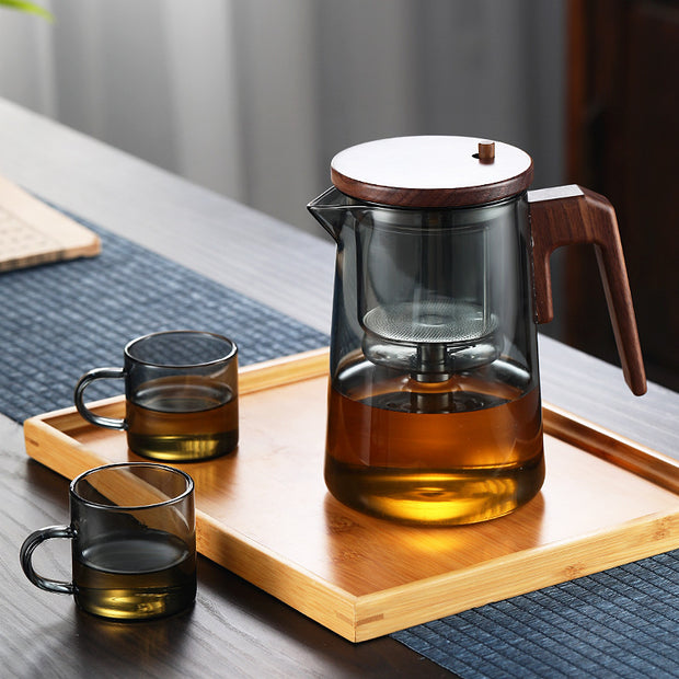 Elegant glass teapot showcasing tea brewing process