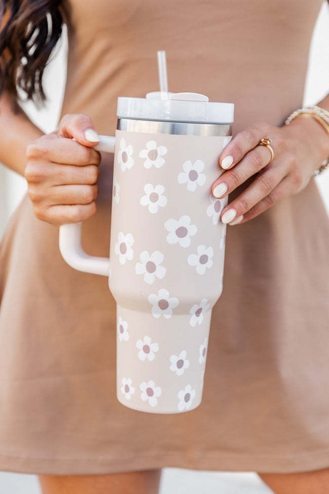 Large 1200ml thermal insulated water cup with straw, featuring a stylish floral pattern. Keeps drinks hot or cold for 24 hours, perfect for daily hydration.