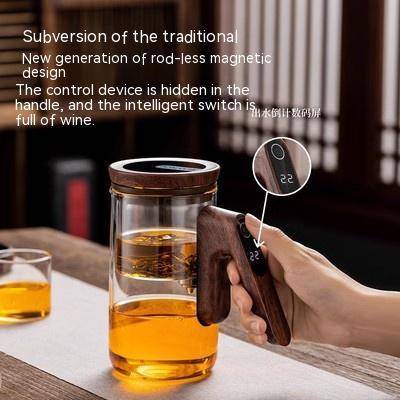 Glass tea pot with intelligent timing and automatic filter, pouring freshly brewed tea into an elegant cup. Designed with a full glass liner for precision brewing.