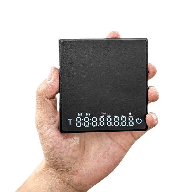 Smart coffee scale with high-precision 0.1g accuracy and built-in timer, compact and rechargeable, ideal for precise pour-over brewing at home or café.