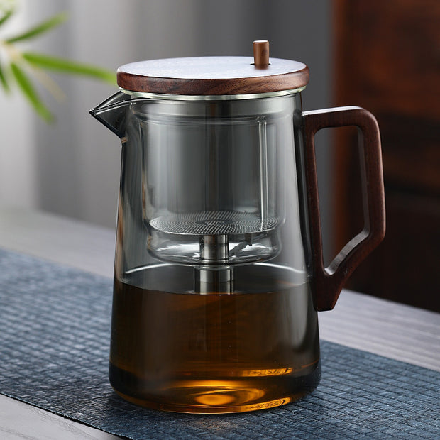 Elegant glass teapot showcasing tea brewing process