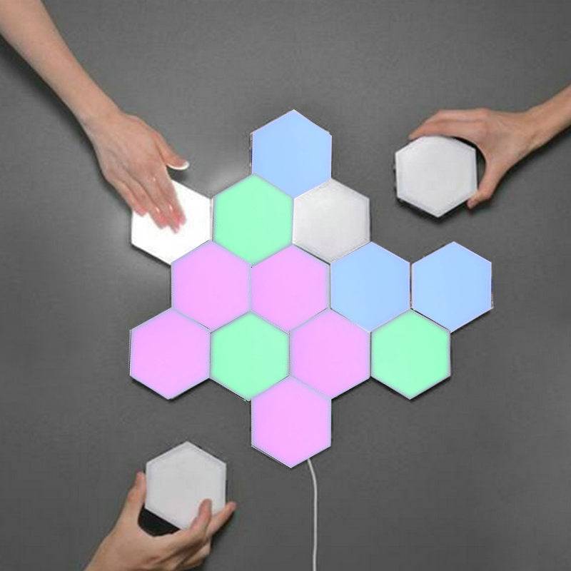 Wireless smartphone controlled LED modular honeycomb light with customizable hexagonal panels in pastel colors. Ideal for DIY home lighting decor.