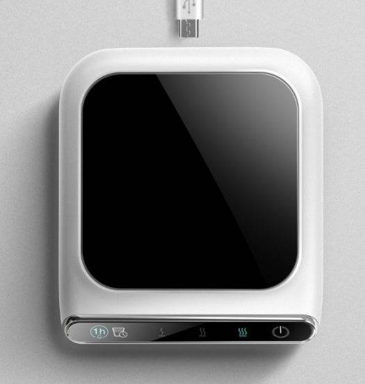5V mini cup warmer USB coffee heater in black and white with touch controls. Ideal for keeping beverages warm at home or office.
