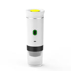 Portable eco-friendly white coffee machine with yellow top and green power button, featuring a clear base for espresso.