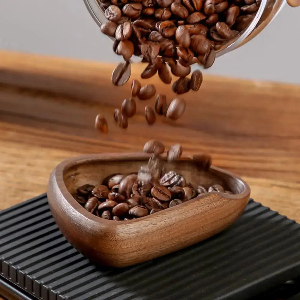 Walnut coffee dose tray for precision brewing, featuring a handcrafted wooden design. Ideal for measuring coffee beans accurately and stylishly.