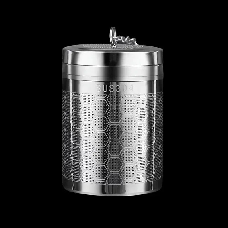 Stainless steel tea strainer in teapot

