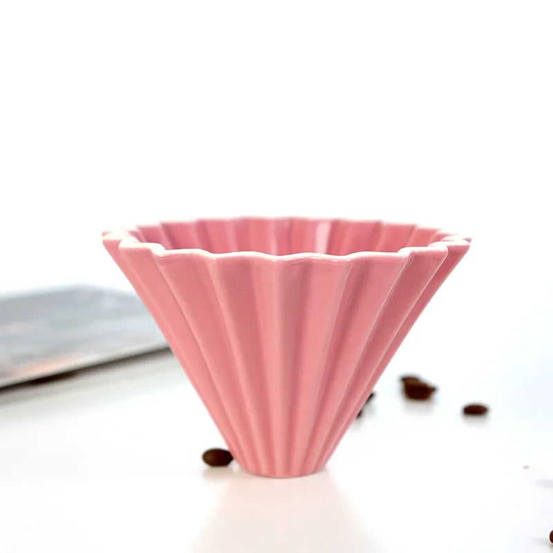 Close-up of the origami-inspired design of the coffee filter cup