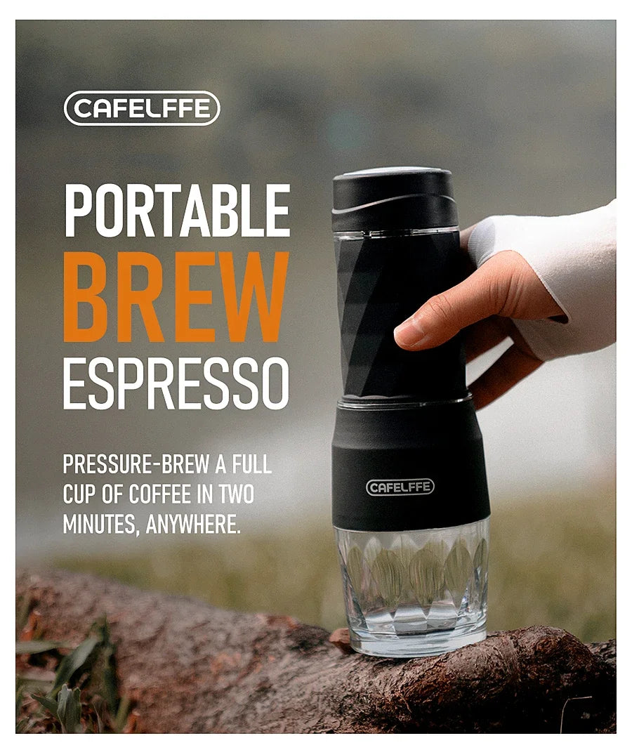 Cafelffe portable espresso maker with a black and clear design, held in a hand, resting on a wooden surface outdoors.