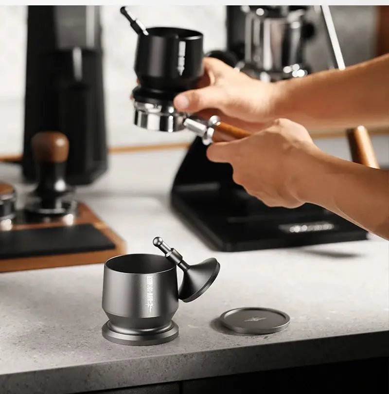 MHW-3BOMBER Coffee Dosing Funnel Aluminum Alloy Dosing Shaker in use with espresso machine, fits 51-54mm portafilters for home barista setup.