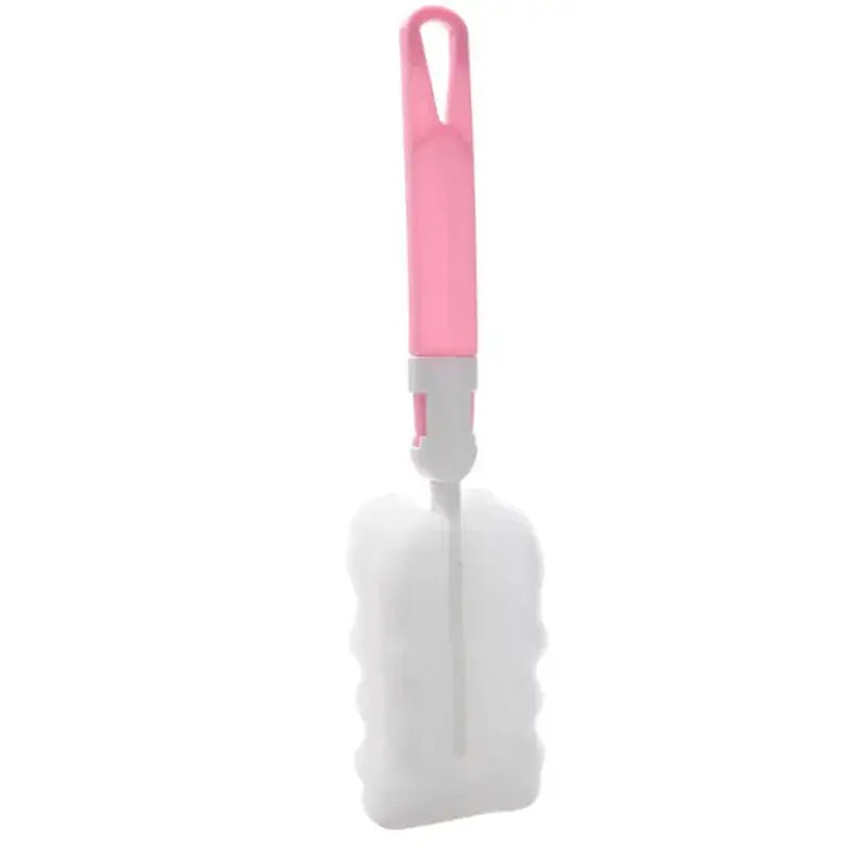 Bottle cleaning brush with pink handle and soft sponge head. Ideal for cleaning water bottles, baby bottles, and narrow containers with ease.