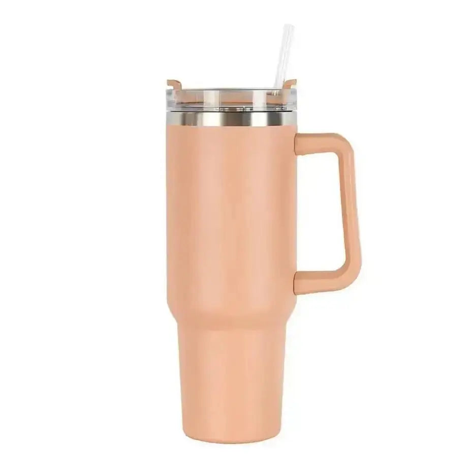 Pink insulated mug with handle and straw on a white background