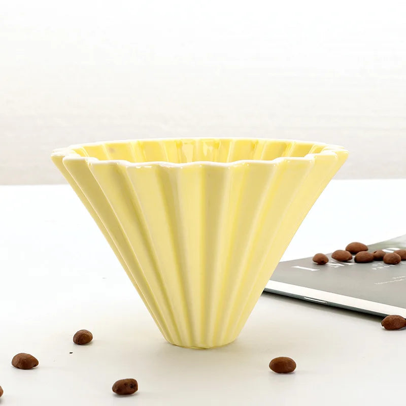 Close-up of the origami-inspired design of the coffee filter cup