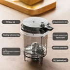 Transparent tea infuser with a PC tea lid, spring pressure valve, and stainless steel filter. Features a sealing silicone ring and removable PC water pressure lever for easy cleaning.