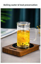 100°C Cup Heater Mug Warmer with 5 gear temperature settings shown warming a paper milk carton on a wooden heating pad for hot beverages.