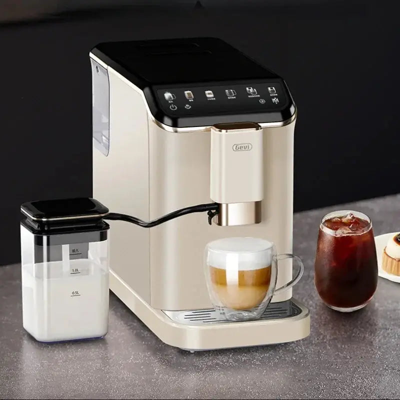 Coffee machine with a glass of coffee and milk pitcher on a dark surface