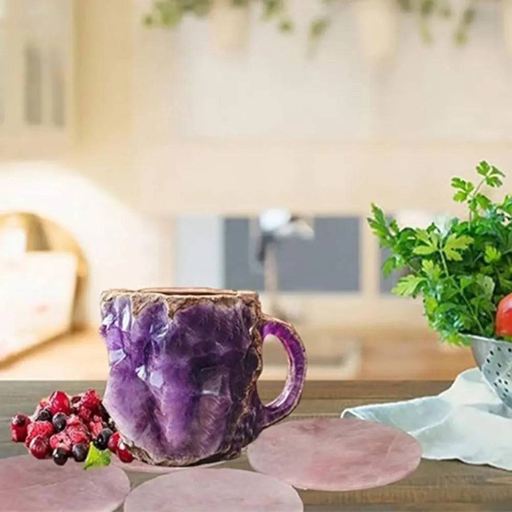 Colorful purple mineral crystal coffee mug with a textured surface and a sturdy handle, set on a wooden table with berries.