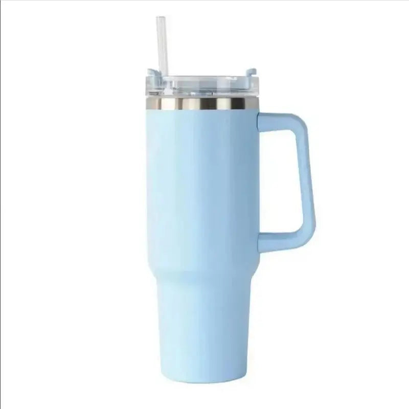 Light blue insulated mug with handle and straw on a white background