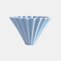 Close-up of the origami-inspired design of the coffee filter cup