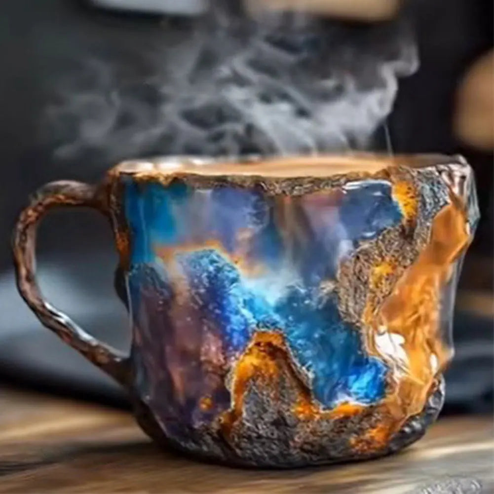 Mystical mug with fiery and blue design on a wooden surface