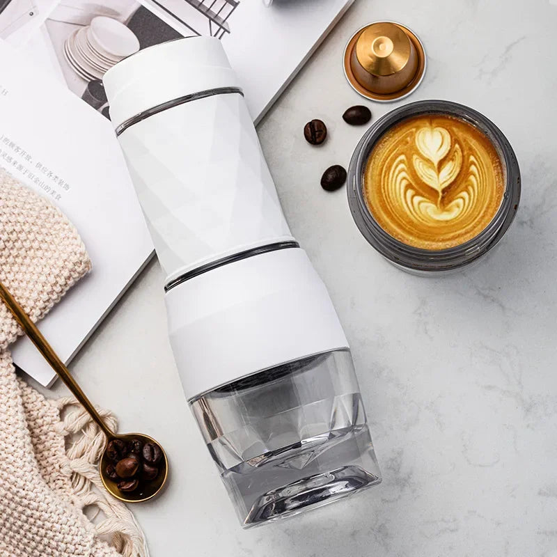 Compact white Cafelffe 3-in-1 Portable Coffee Machine with clear bottom, next to a latte with art and coffee beans.