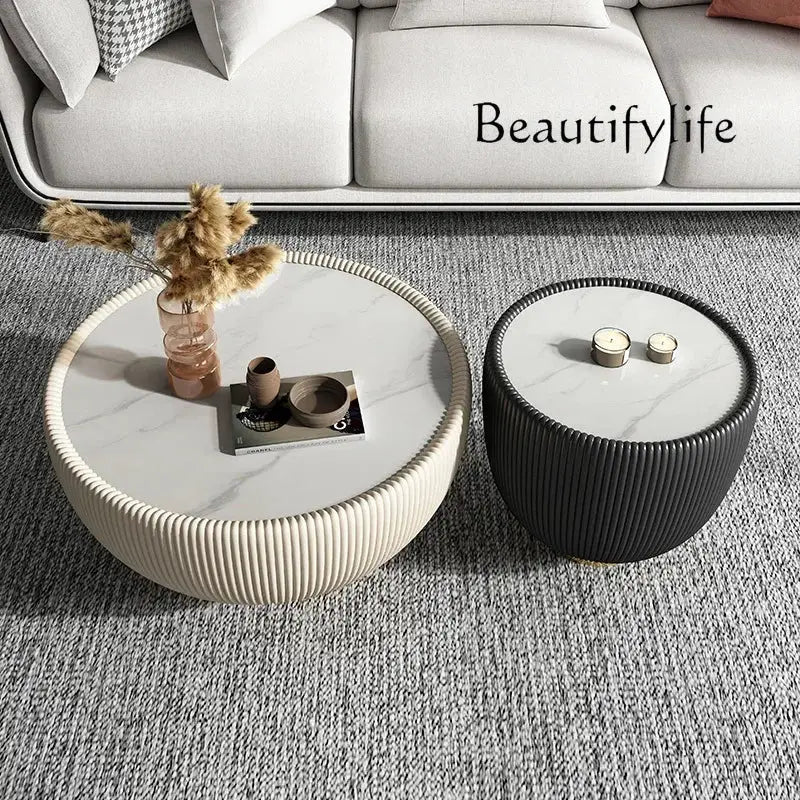 Round marble coffee table and stool with decorative items on a gray carpet, featuring the brand 'Beautifylife'.