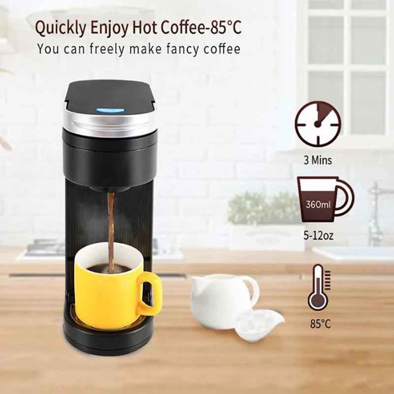 Electric travel coffee maker in black with a drip system, brewing coffee into a bright yellow mug.