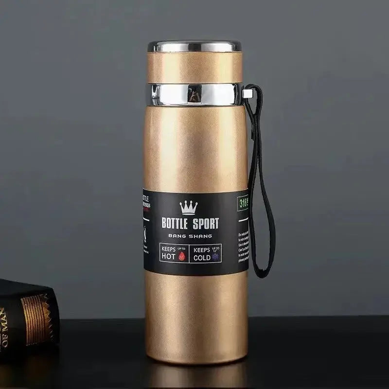 Gold stainless steel thermal water bottle with a leak-proof lid and carrying strap. Keeps drinks hot for 12 hours and cold for 24 hours, ideal for travel.