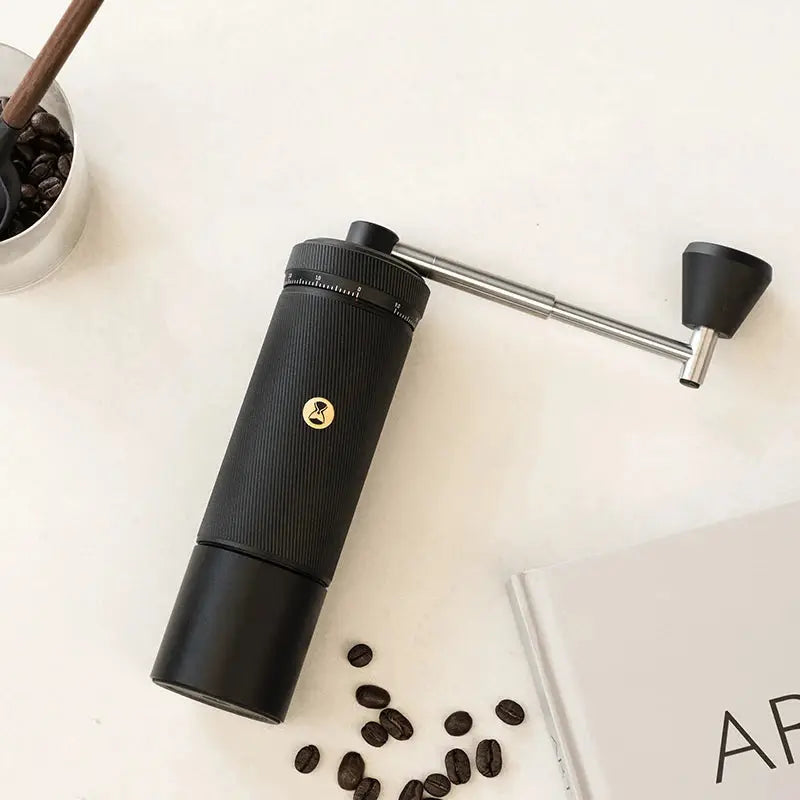 TIMEMORE CHESTNUT S3 Manual Coffee Grinder in black, featuring a sleek design with an external adjustment dial for precision grinding. Ideal for coffee enthusiasts seeking a portable and durable grinder.