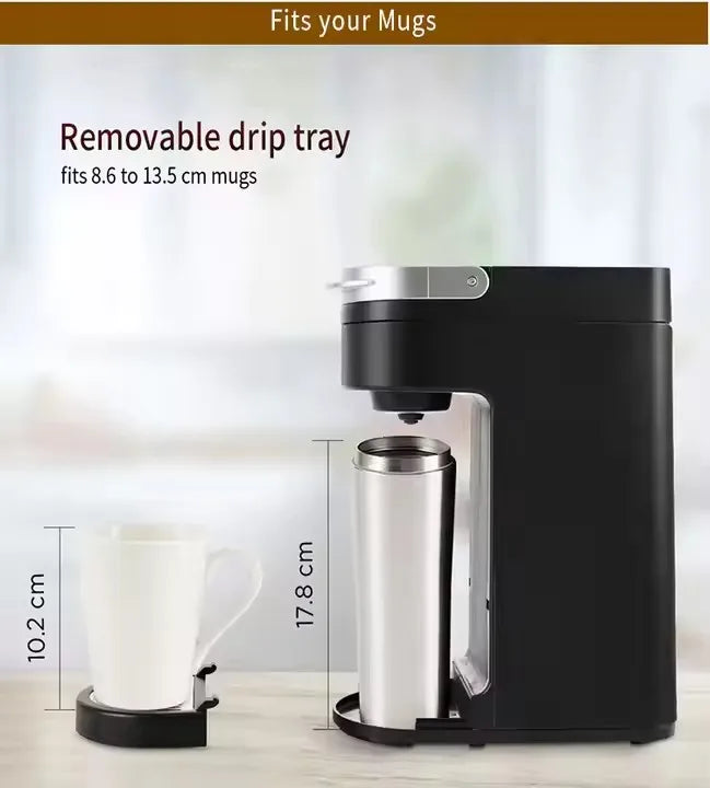 Electric drip coffee maker in black with removable drip tray; fits mugs 8.6 to 13.5 cm tall.