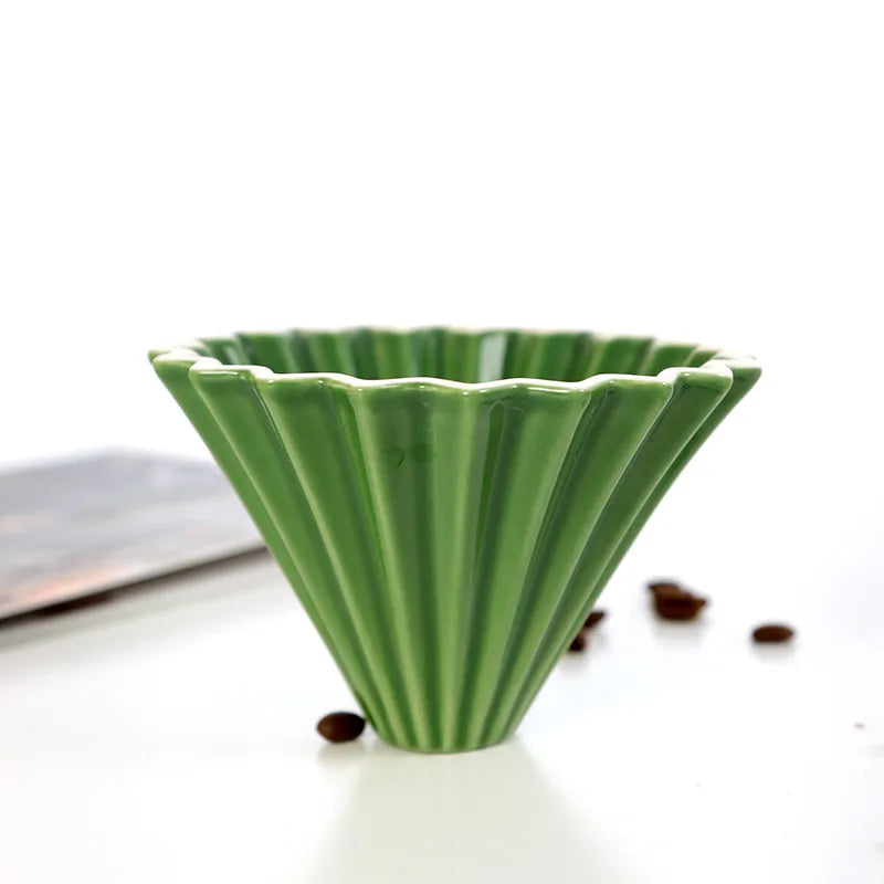 Close-up of the origami-inspired design of the coffee filter cup