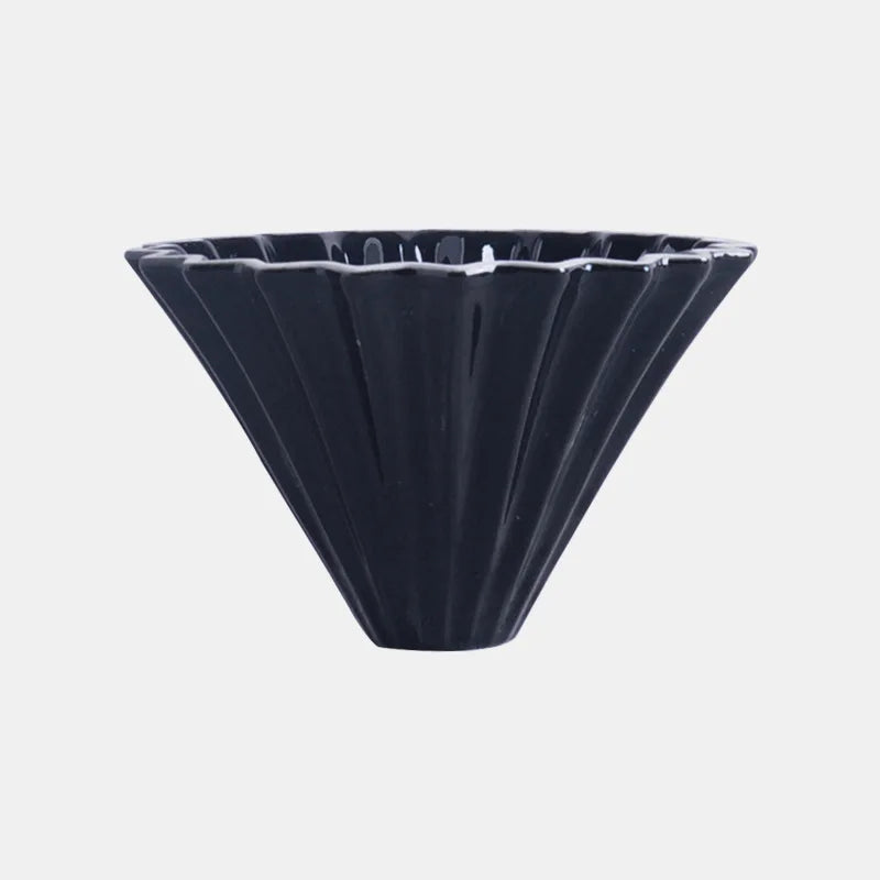 Close-up of the origami-inspired design of the coffee filter cup