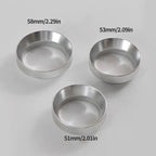 Three metallic bowls of different sizes with measurements on a light gray background