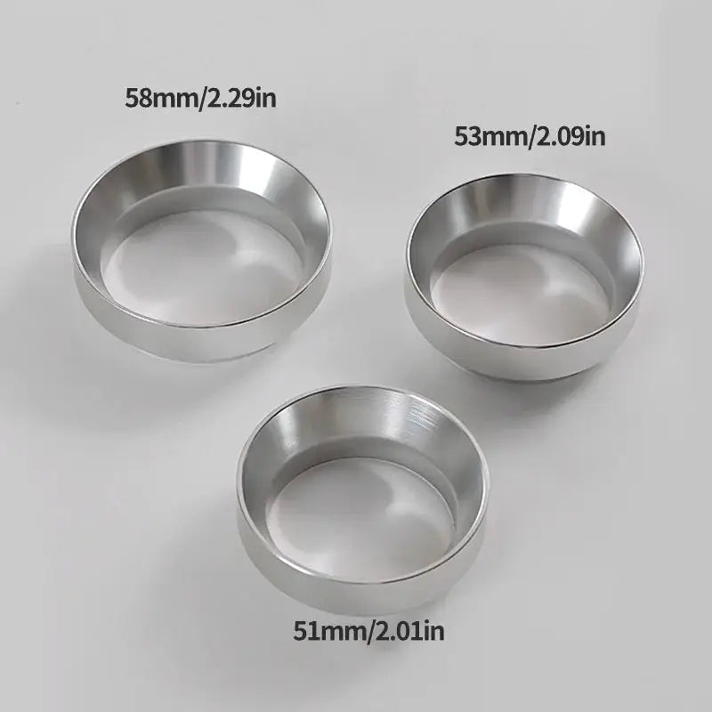Three metallic bowls of different sizes with measurements on a light gray background