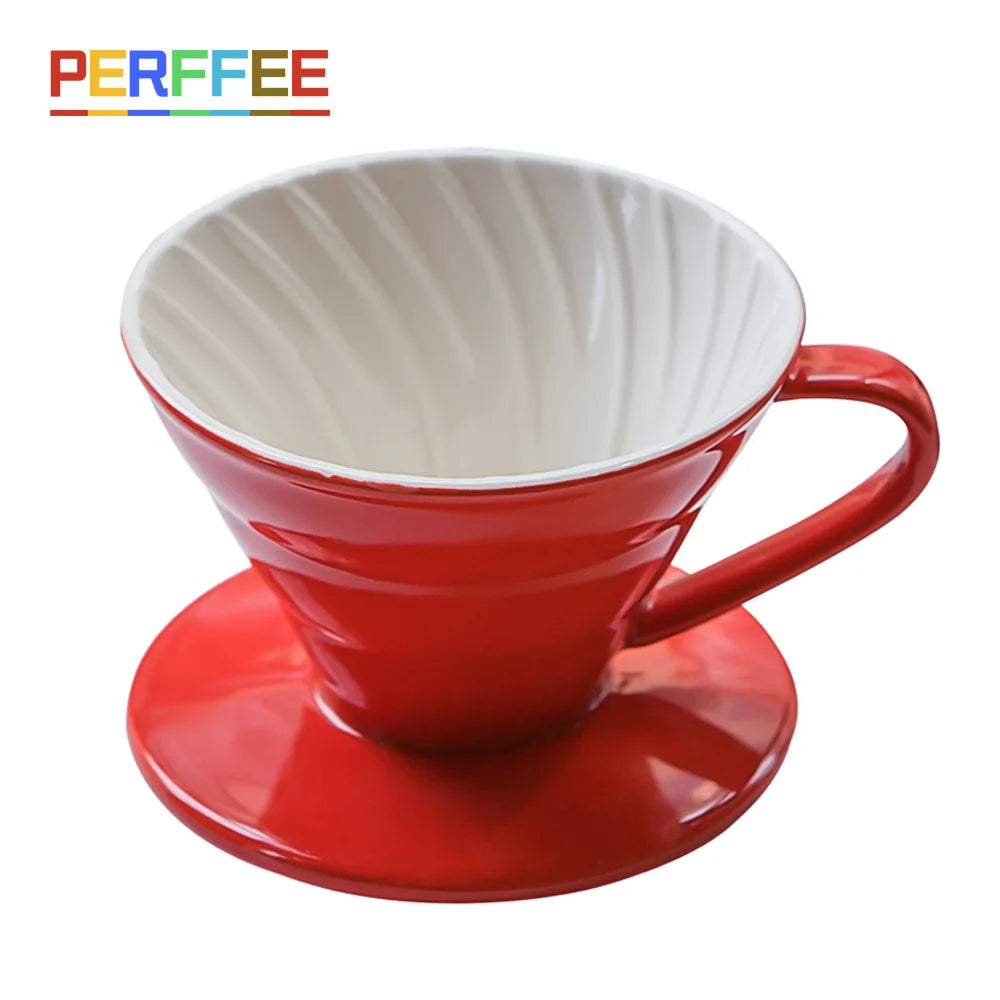 a red coffee cup sitting on top of a saucer