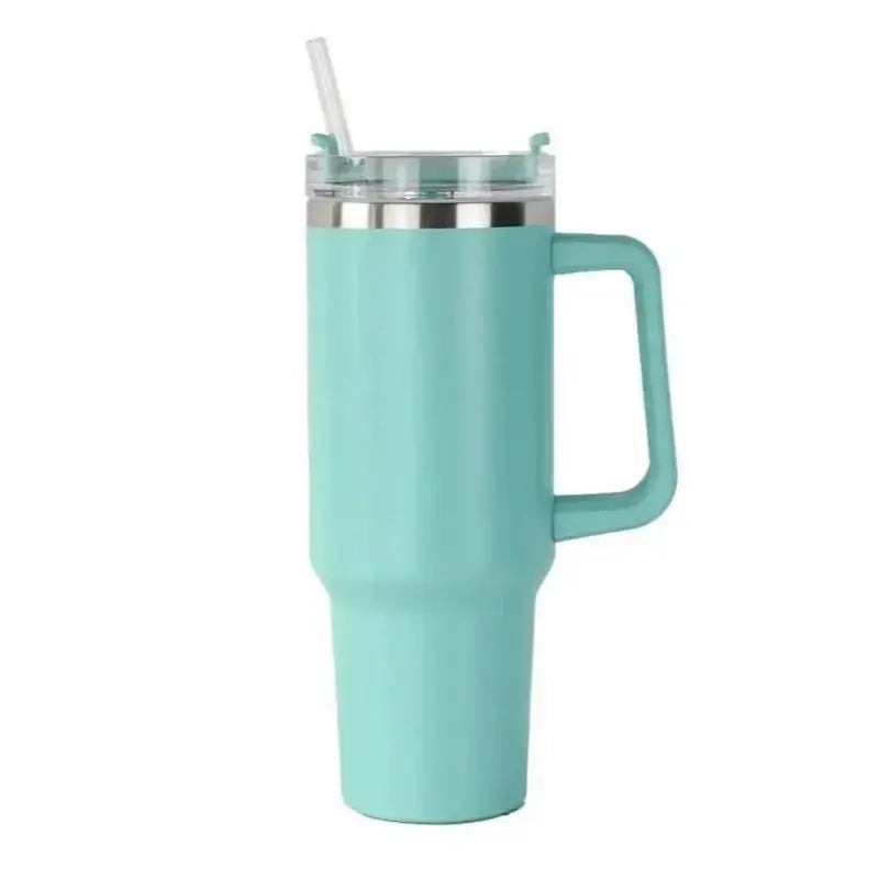 Turquoise insulated mug with handle and straw on a white background